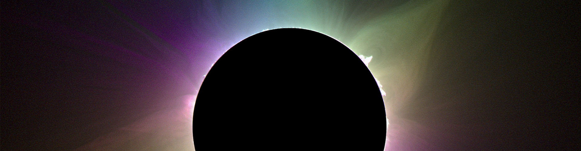 cate_homepage_1920x500 The Sun’s corona, its outermost atmosphere, is typically only visible to the naked eye during a total solar eclipse. The SwRI-led Citizen Continental-America Telescopic Eclipse (CATE) 2024 project evaluated special cameras to measure the polarization of coronal light during the April 2023 total solar eclipse in Exmouth, Western Australia. In this image, the colors indicate the polarization or orientation of the light. The white features, called prominences, have no polarization.